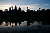Grassy Puddle (Angkor Wat Temples Part I) Photo: Angkor Wat's silhouette reflected in a pool of rainwater.