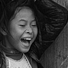 Laughs (Miao Minority II) Photo: Miao minority girls yucking it up.