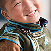 Traditional Vest Photo: A young Mongolian boy dressed in ceremonial garb.