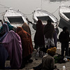 Varanasi Vessels Photo: Hindu pilgrims prepare for a dawn boat ride on the Ganges river.