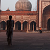Sacred Sandstone Photo: A Muslim man walks out the east entrance of Delhi's Jama Masjid (Main Mosque).
