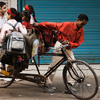 The Short Rickshaw Photo: A gaggle of elementary school girls pile into a cycle rickshaw to get their learn on.