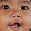 Junior Gypsy Photo: A smiling Chao Leh sea gypsy baby.