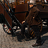 Guild House Giddyup Photo: A tourist sightseeing carriage driver poses for a photograph at Grote Markt Square.