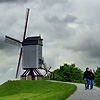 Windmill Walkers Photo: Tourists descend down a path after visiting a model windmill.