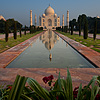 Taj Digital Gardening Photo: A distant view of the Taj Mahal at sunrise reflected in the first of two fountains. (From the archives due to time restraints.)