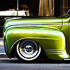 photo: Vintage Vehicle - A vintage Plymouth Deluxe parked outside of a restaurant.  (From the archives due to time restraints.)