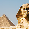 Sphinx Perspective Photo: The head of the Sphinx and Pyramid of Menkaure, the furthest of the three major Giza pyramids.