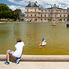 Park Play (before/after) Photo: A boy plays with a sailboat at the Jardin de Luxembourg in Paris.