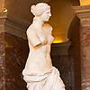 Lone Shooter Photo: A lone tourist admires the Venus de Milo statue at the Louvre museum in Paris.