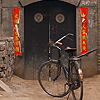Asian Alley Photo: An old bicycle is left parked at the end of a traditional Chinese alleyway in Pingyao, China (ARCHIVED PHOTO on the weekends - originally photographed 2007/07/04).
